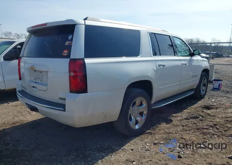 2017 Chevrolet Suburban Premier z USA, uszkodzony, nr VIN 1GNSCJKC2HR258693